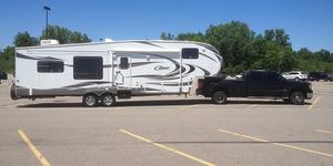 Pickup moving a large recreational trailer